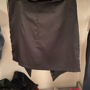 Black mini skirt with leather detail